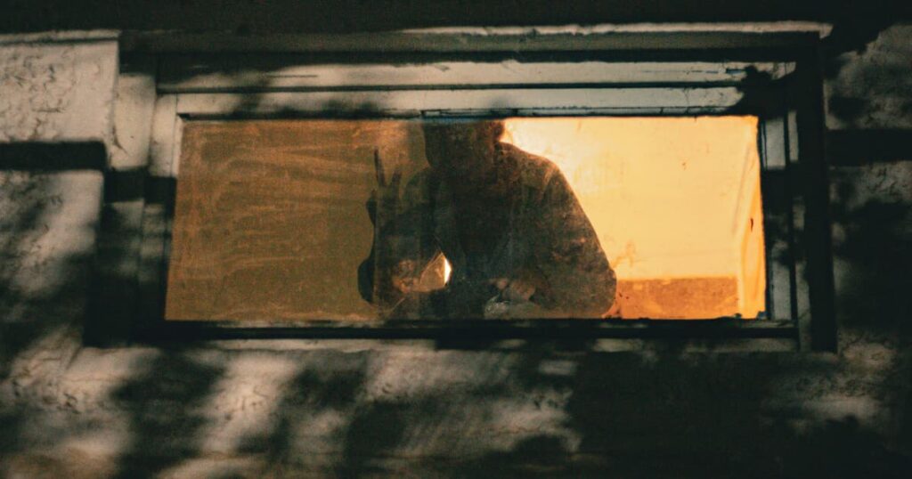 Creepy Figure Window